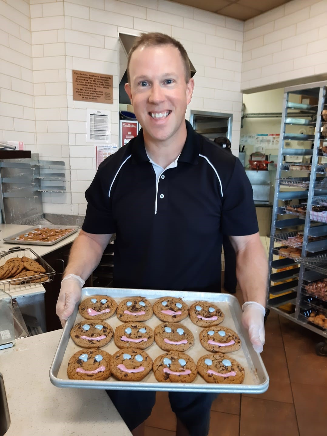 Schooley-Mitchell-Ontario-Michael-Baznick-community-involvement-tim-hortons-smile-cookies-2022-02