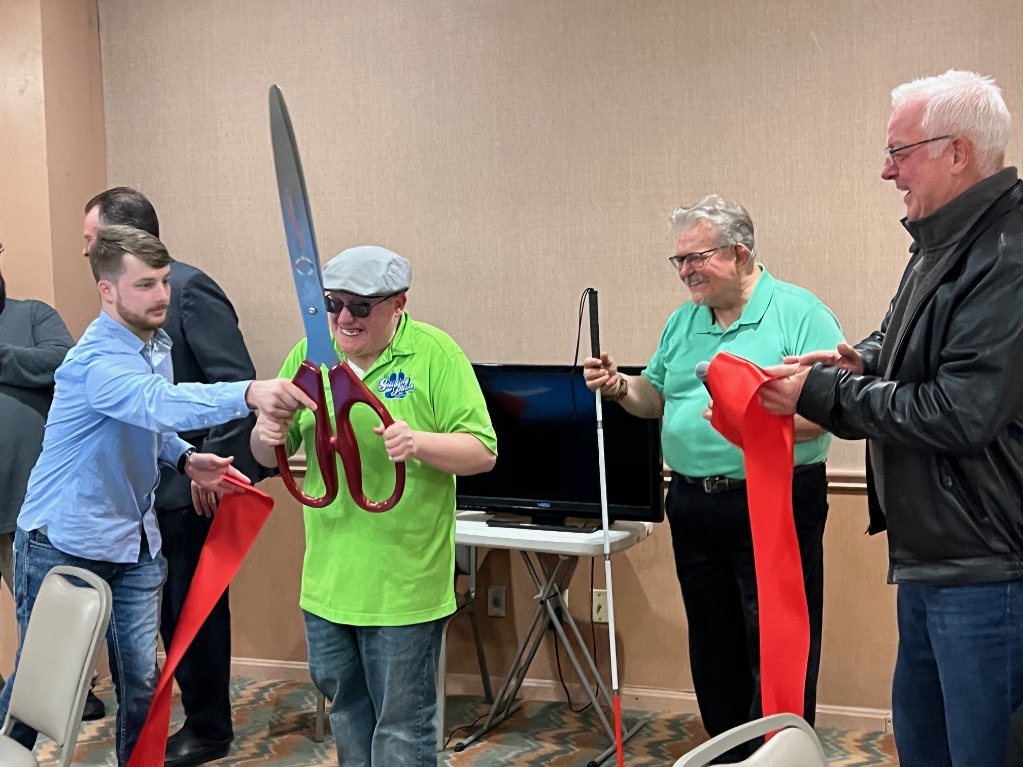 Guiding Paws Ribbon Cutting Ceremony - Schooley Mitchell